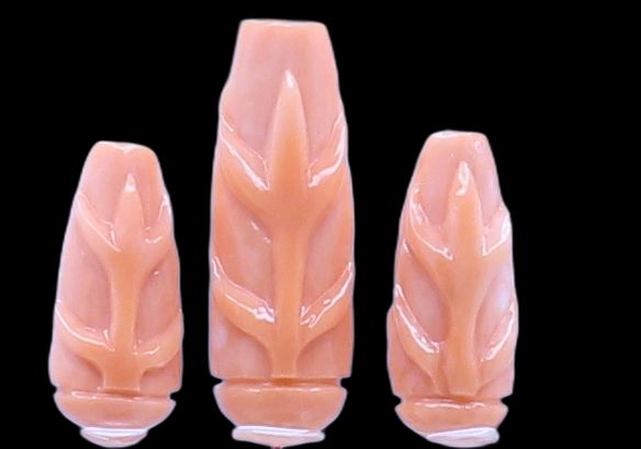 Momo Carved